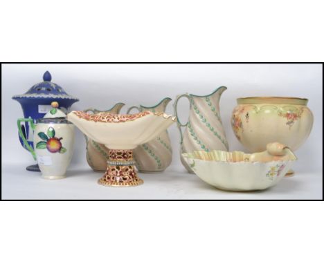 A collection of ceramics to include a large Victorian Wedgwood jasperware urn with pierced frog lid, Crown Devon Fieldings ur