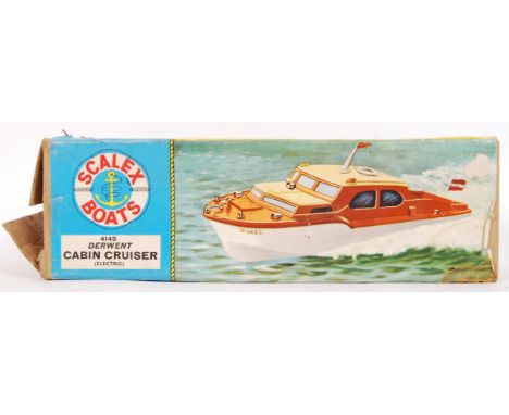 A vintage Triang Scalex Boats electric 414S Derwent Cabin Crusier. Near complete, missing rear flag mast. Measures approx 36c