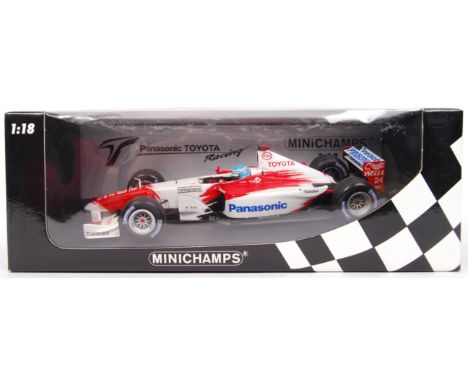 A large 1:18 scale Minichamps diecast model Panasonic Toyota racing F1 Formula One car. Appears mint within the original box.