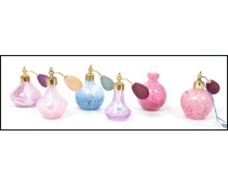 A group of five vintage 20th century Caithness studio art glass perfume bottles, one with an elongated wick the others being 