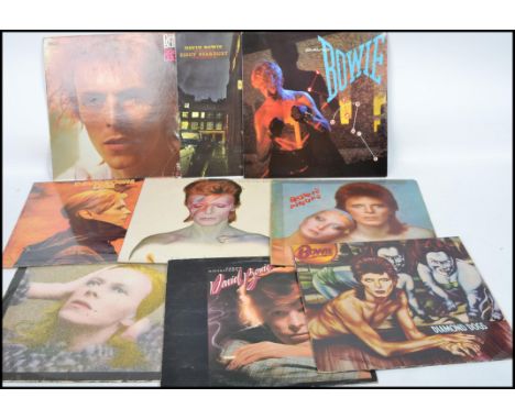 A collection of vintage long play LP vinyl record albums pertaining to David Bowie to include Aladdin Sane, low, Lets Dance, 