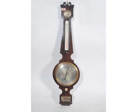 A good Georgian 19th century rosewood banjo mercury wall barometer having silvered dial and thermometer, dry damp gauge, bone