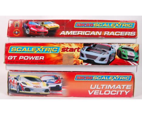 A quantity of 3x Micro Scalextric 1/32 &amp; 1/64 scale slot car racing sets to include; Ultimate Velocity, American Racers &