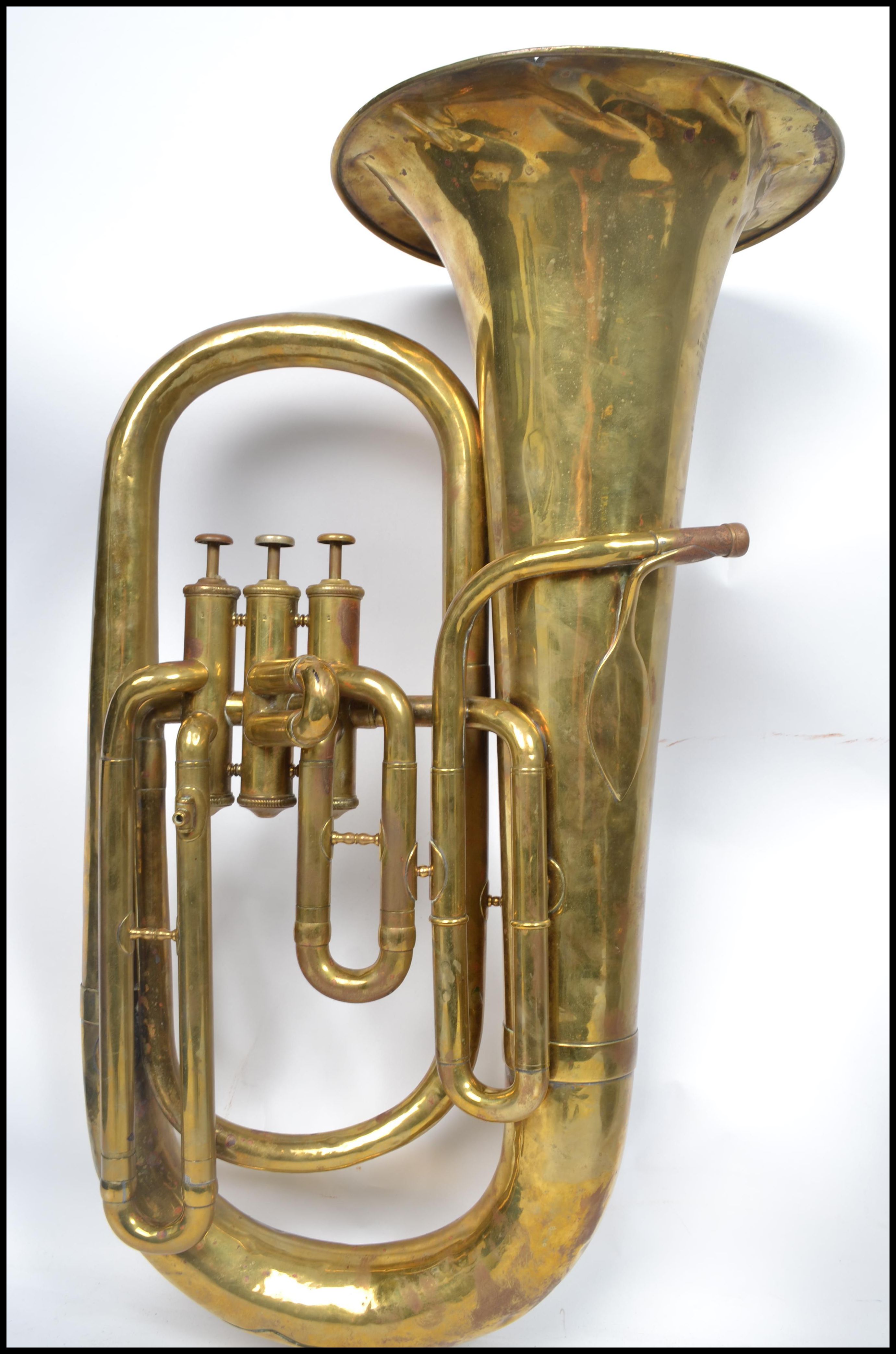 A vintage 20th century brass tuba musical instrument by A Hall Gisborne