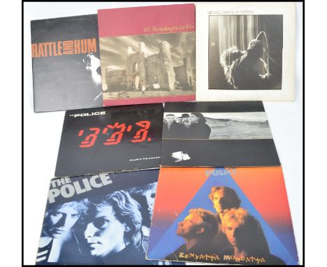 A collection of vintage long play LP vinyl record albums pertaining to The Police and U2 to include The Joshua Tree, Unforget