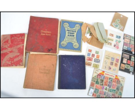 A good collection of vintage stamps in albums dating from the 19th century to include many Great Britain stamps Penny Reds, C