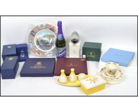 A collection of vintage boxed ceramics to include a Swarovski paperweight, Carlton Ware, Royal Doulton etc. Please see images