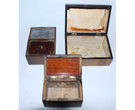 A 19th century mahogany and rosewood cross banded tea caddy, together with one other rosewood tea caddy and a Victorian walnu