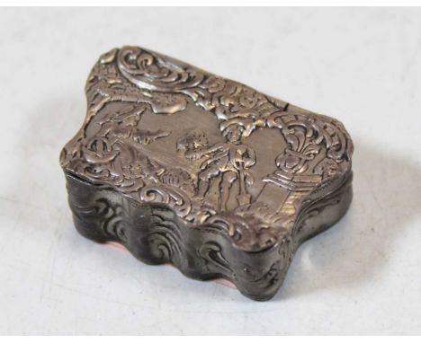 An early 20th century continental silver snuff / pill box, of serpentine form, the hinged lid relief decorated with a courtsh