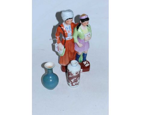 A reproduction Chinese figure of mother and daughter, height 33cm, together with a Chinese vase of cylindrical form decorated