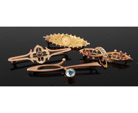An Edwardian 9ct gold blue topaz set bar brooch, 52mm; together with an Edwardian ruby and seed pearl set bar brooch with saf