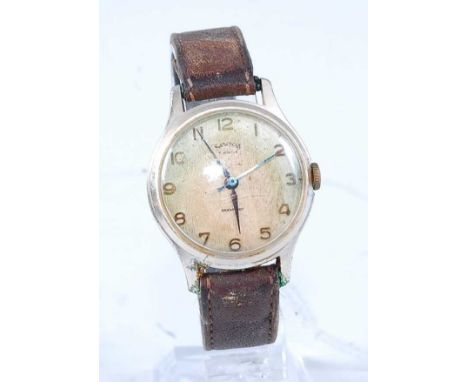 A gent's Services manual wind wristwatch, having signed champagne dial (distressed), in gilt metal case, case dia.32mm, on po