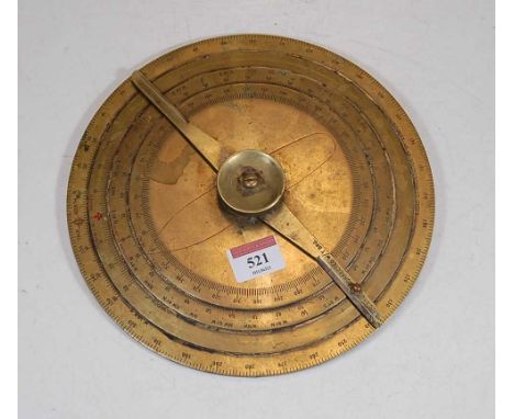 A brass compass, having four graduated dials marked True North, Magnetic North, Compass North, and Ships Head, stamped Radio 