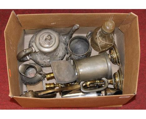 A box of miscellaneous metalware, to include a pair of brass figural candlesticks, cocktail shaker, novelty nutcracker etcCon