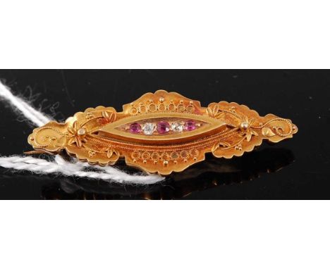 A late Victorian 15ct gold, ruby and diamond set elliptical brooch, 3.9g, Chester 1895, 42mm