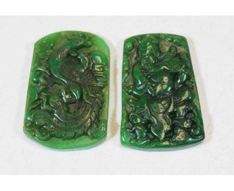 A reproduction Chinese jade coloured pendant carved as a peacock, 6.5cm; together with another carved as a warrior, 6cm (2)