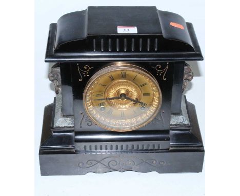 A late Victorian black slate cased mantel clock of architectural form, having a gilt dial with Roman numerals and eight day m