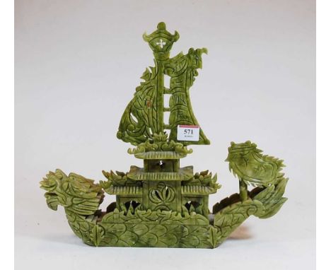 A jade coloured polished hard stone model of a Chinese house boat, height 32cm