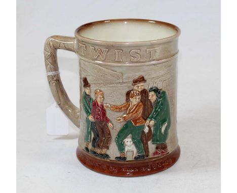 A Royal Doulton Oliver Twist tankard, having printed mark verso, height 15cm