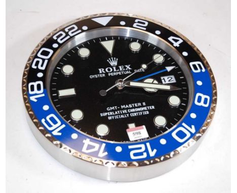 A brushed aluminium wall clock the dial in the form of a Rolex Oyster Perpetual Date GMT Master II chronometer, boxedConditio