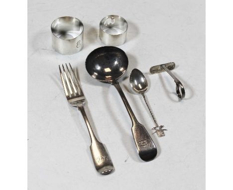 A 19th century silver sauce ladle; together with two silver napkin rings; a baby-feeder; silver teaspoon; and a silver plated