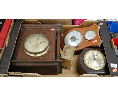 An early 20th century oak cased mantel clock, together with one other Swiss bakelite cased mantel clock, brass cased carriage