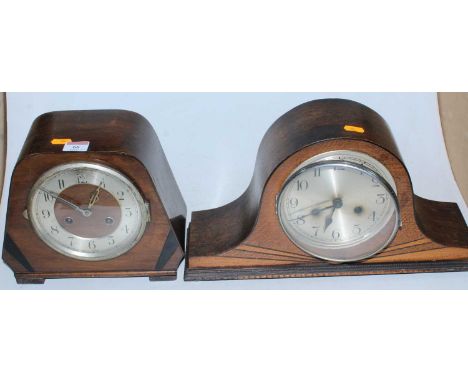 An Art Deco oak cased mantel clock having a silvered dial with Arabic numerals and eight day movement, together with one othe