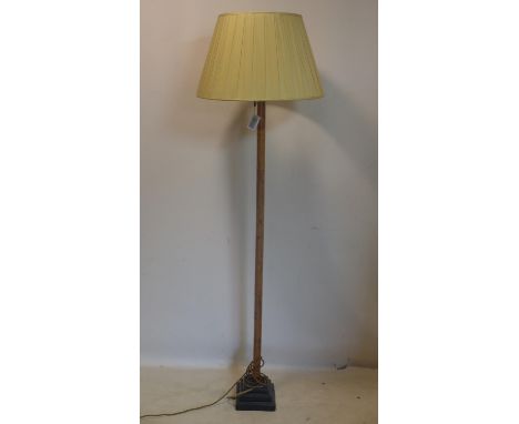 A 20th century bamboo standard lamp on ebonized base, H.161cm 
