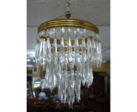 A Venetian style drop chandelier together with a pair of matching wall lights 