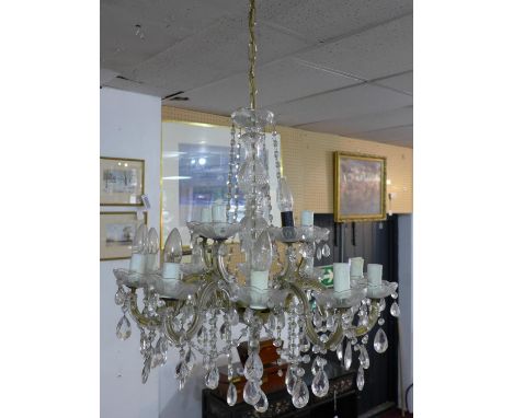 A 20th century 15 branch chandelier, with floral sconces and glass droplets, H.66 Diameter 58cm 