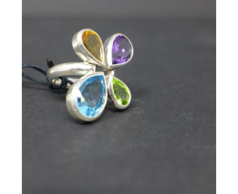 A sterling silver ring set with 4 pear-drop shaped faceted stones to include blue topaz, citrine, peridot and amethyst, 9g 