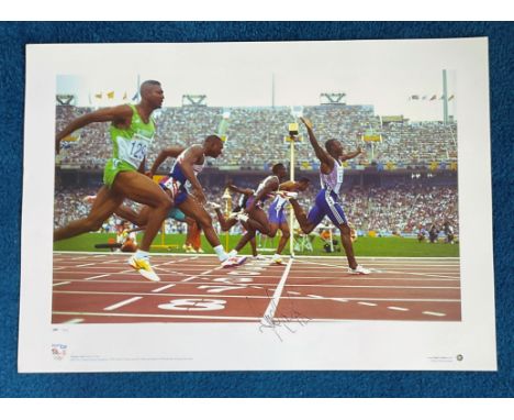 Linford Christie signed 22x16 colour Team GB Olympic Gold Big Blue Tube print. Linford Christie Olympic Games Barcelona 1992.