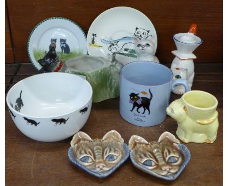 A collection of cat novelties, including a Beswick kitten, cat egg cup, French plate, candlestick, etc., (10)