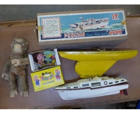 A Penguin Avon 17" model luxury motor cruiser, boxed, a model yacht, a Pelham puppet, JC Boy, boxed, and a Chilton soft toy m