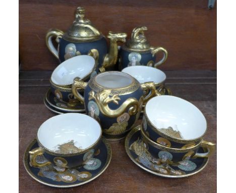 An early 20th Century Japanese Satsuma six setting tea service