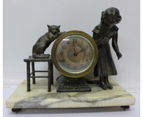 A table clock on marble plinth, with a patinated bronze figure of a girl with cat on a stool