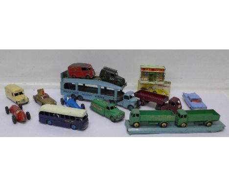 A Dinky Toys 223 McLaren M8A Can Am, boxed, a Dinky 283 BOAC coach, Aston Martin DB5, Daimler Ambulance, Dinky Toys Castrol t