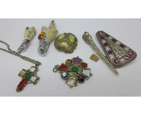 Celtic style brooches, a pendant marked Hollywood, etc.