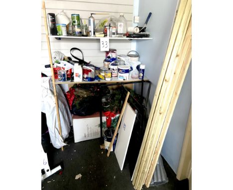 The contents of two shelves, including lengths of wood, an artificial Christmas tree and decorations, part used tins of paint