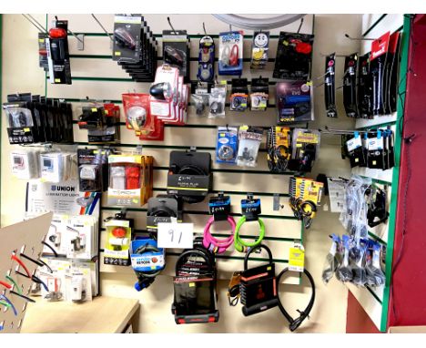 A quantity of boxed / original packaging bike parts and accessories, including Raleigh, Alpha Plus, Oxford and Tiger bike loc