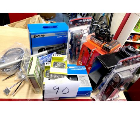 A quantity of boxed / original packaging bike parts including Shimano Shift Lever and Casette Sprocket, two Clarks CMD-21 Mec