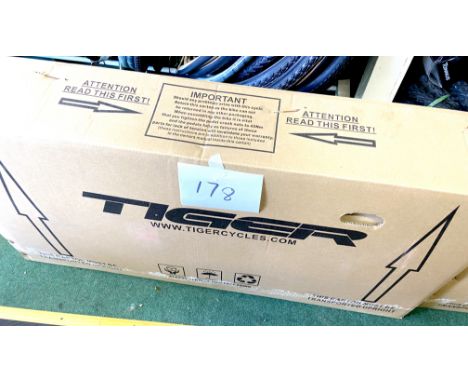 A Tiger Warrior 20x12" orange painted boy's bike, model TG2011, boxed. (NOTE: this item has not been opened or inspected) 