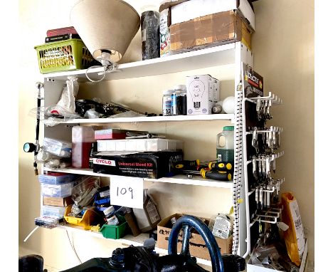 A quantity of bike parts, tools and fittings, including a rack of Coyote Drop Off Selectors, screwdrivers, Cyclo Universal Bl