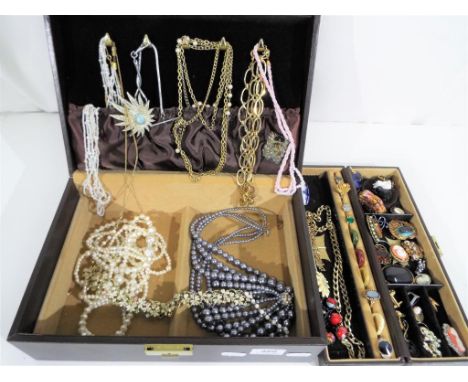 A faux leather finish jewellery box, containing double layers of good quality predominantly vintage costume jewellery to incl