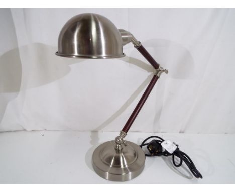A good quality adjustable table lamp.