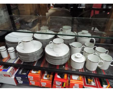 A quantity of German dinner and tea ware by Thomas to include plates, cups, saucers and similar 