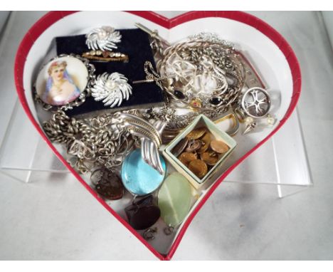 A box containing a quantity of predominantly white metal and silver jewellery, also included in the lot is a ceramic Limoges 