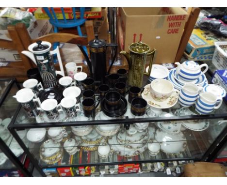 A Portmerion pottery coffee set designed by Susan Williams Ellis in the Magic City pattern and a quantity of blue and white S