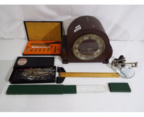 A mantel clock with Westminster chime, with pendulum and key purchased in 1985, also included in the lot is a quantity of dra