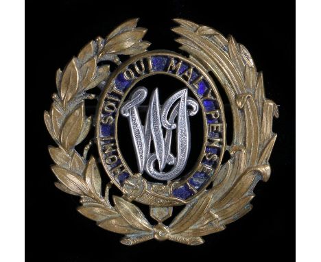 Scarce officers pagri badge in silver gilt and enamel to the West Indies Regiment, pin fitting to the reverse